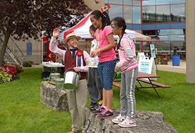 Costumed interpreter leads a program on Canada Day