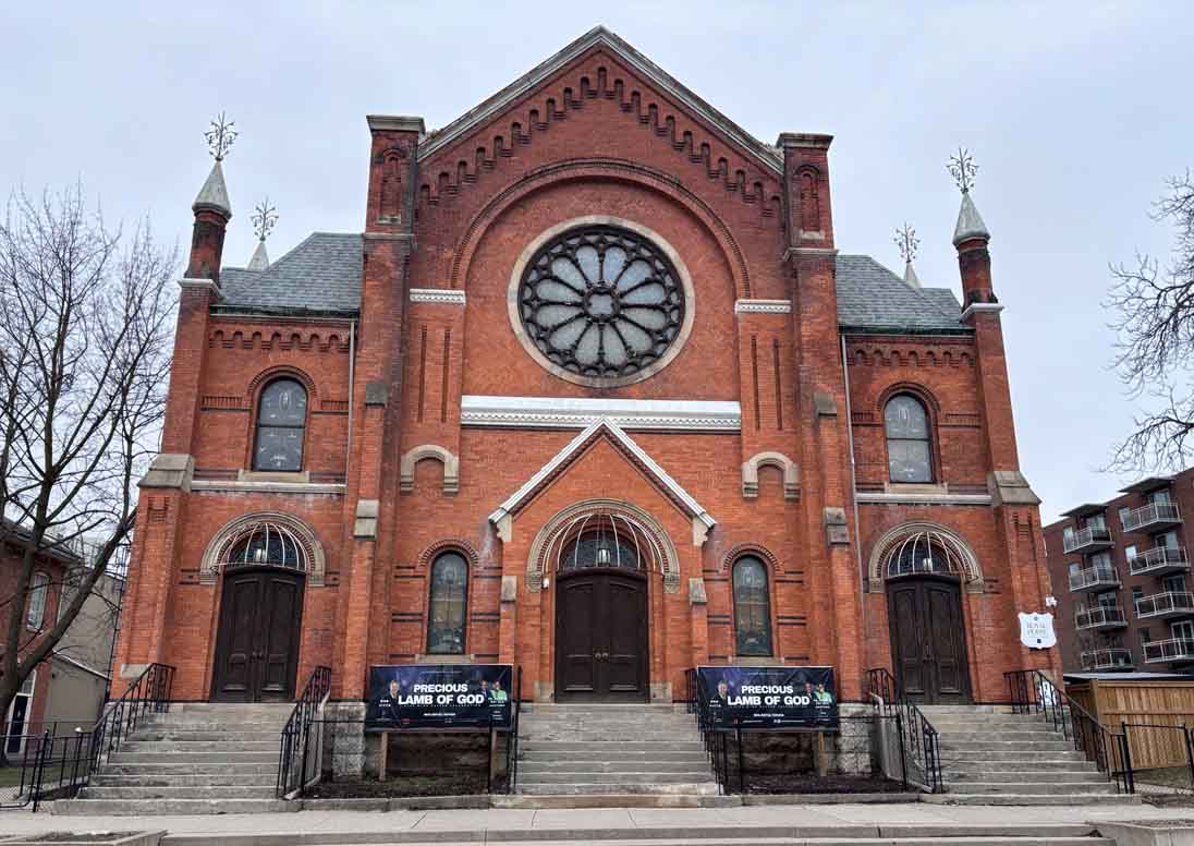 Royal House Church with red brick and large rose window