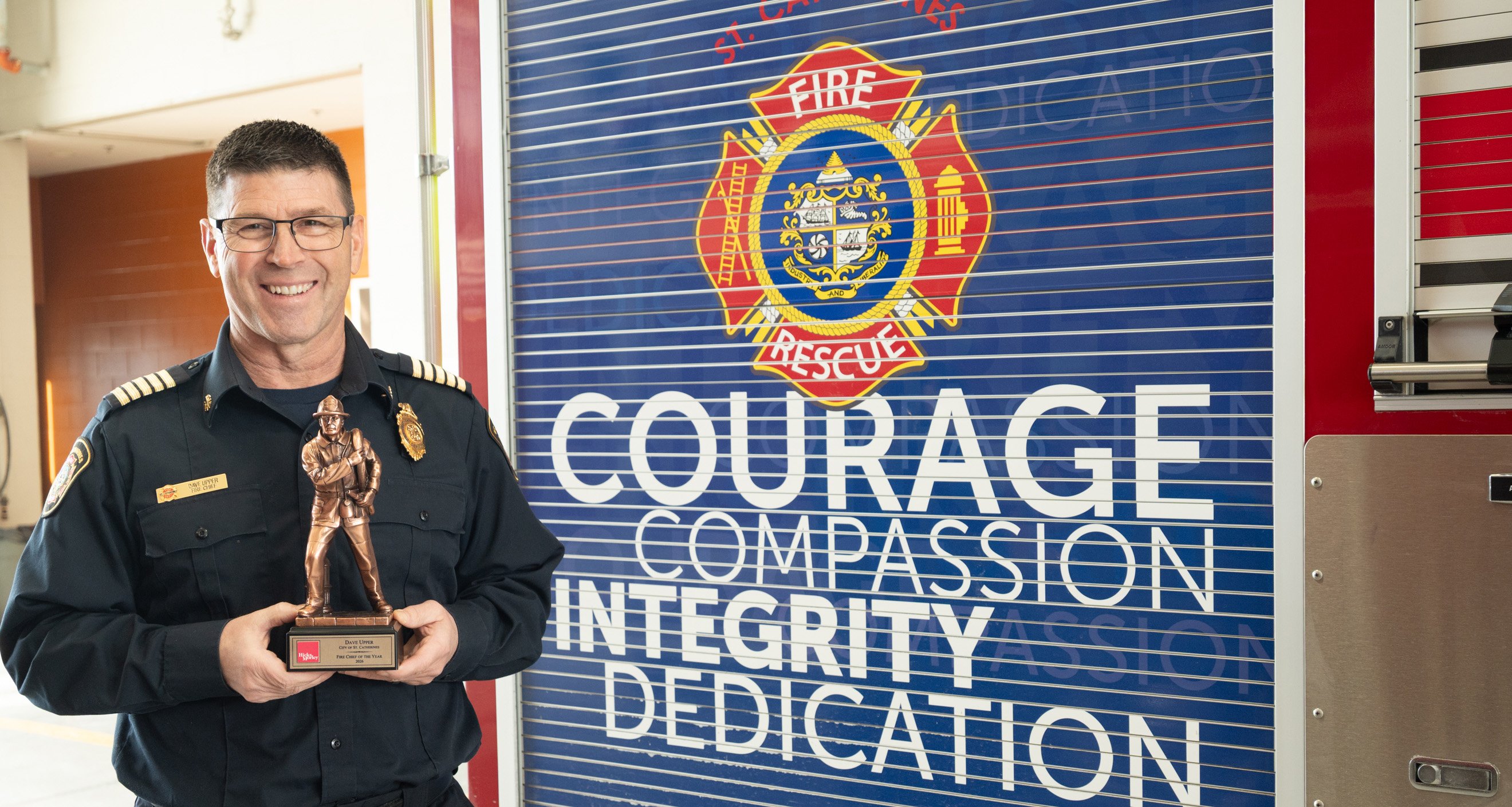 Fire Chief Dave Upper with his fire chief of the year award