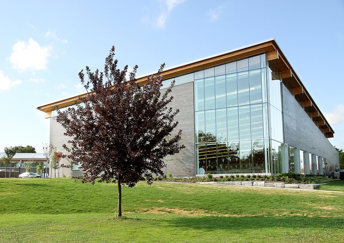 St. Catharines Kiwanis Aquatics Centre with tree in the foreground