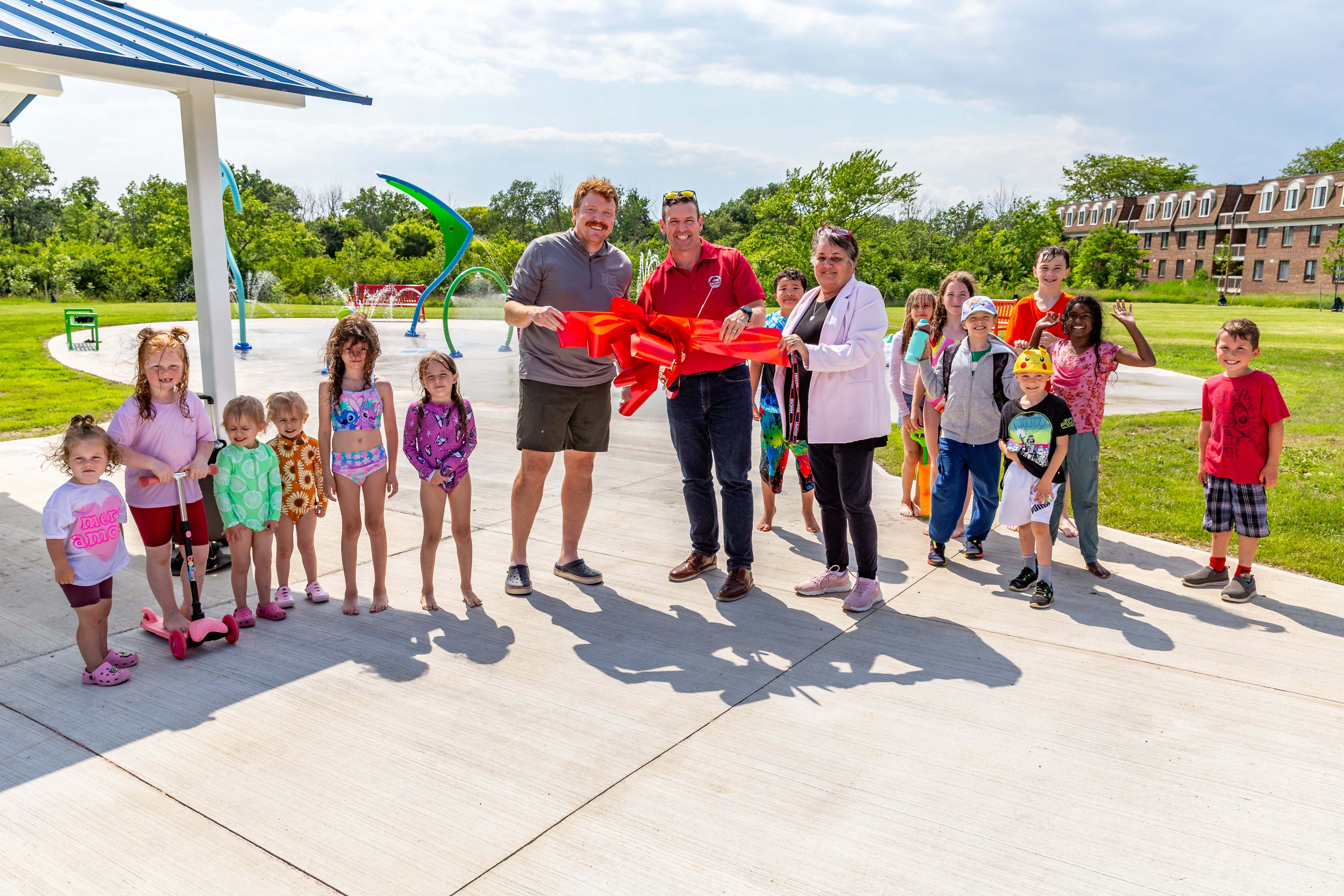 Mayor Mat Siscoe was joined by members of City Council, City staff and the Recreation Master Plan Advisory Committee to “officially” turn on the water on at the new Secord Woods Park Splash Pad Tuesday, June 10.