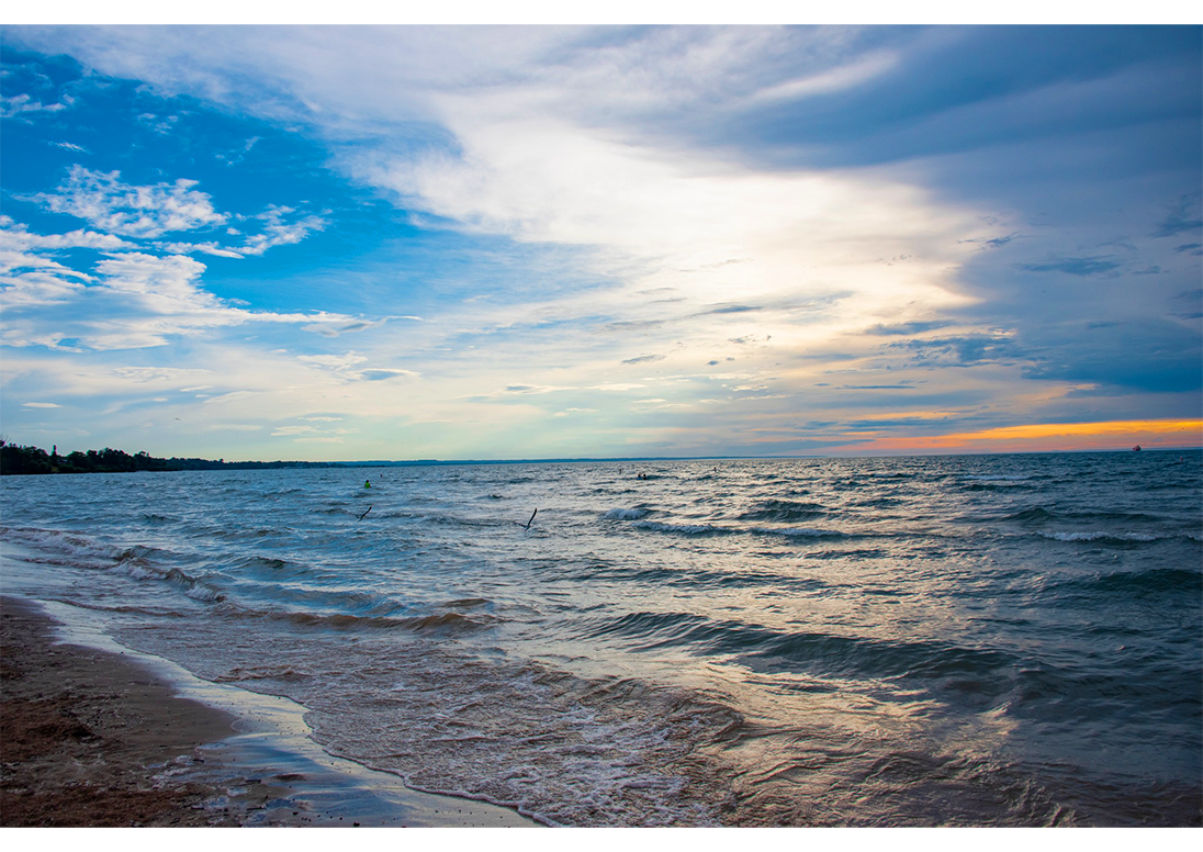 Photo of a beach at sunset.