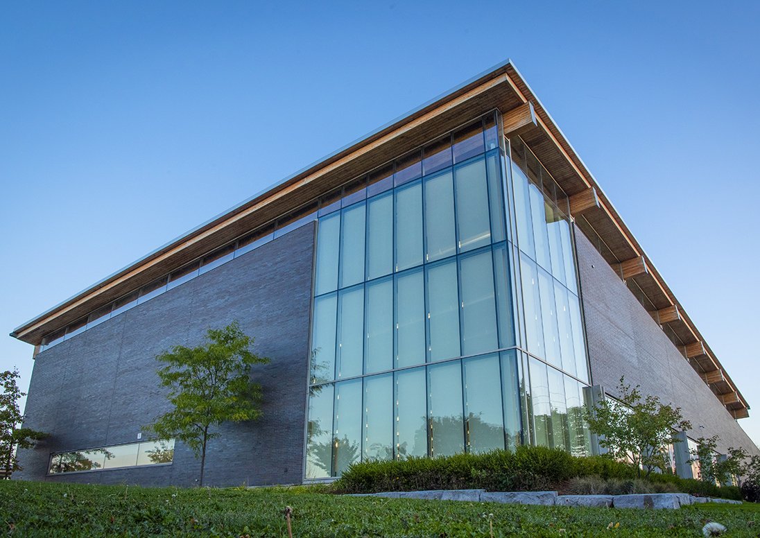 Kiwanis Aquatics Centre with the sun setting