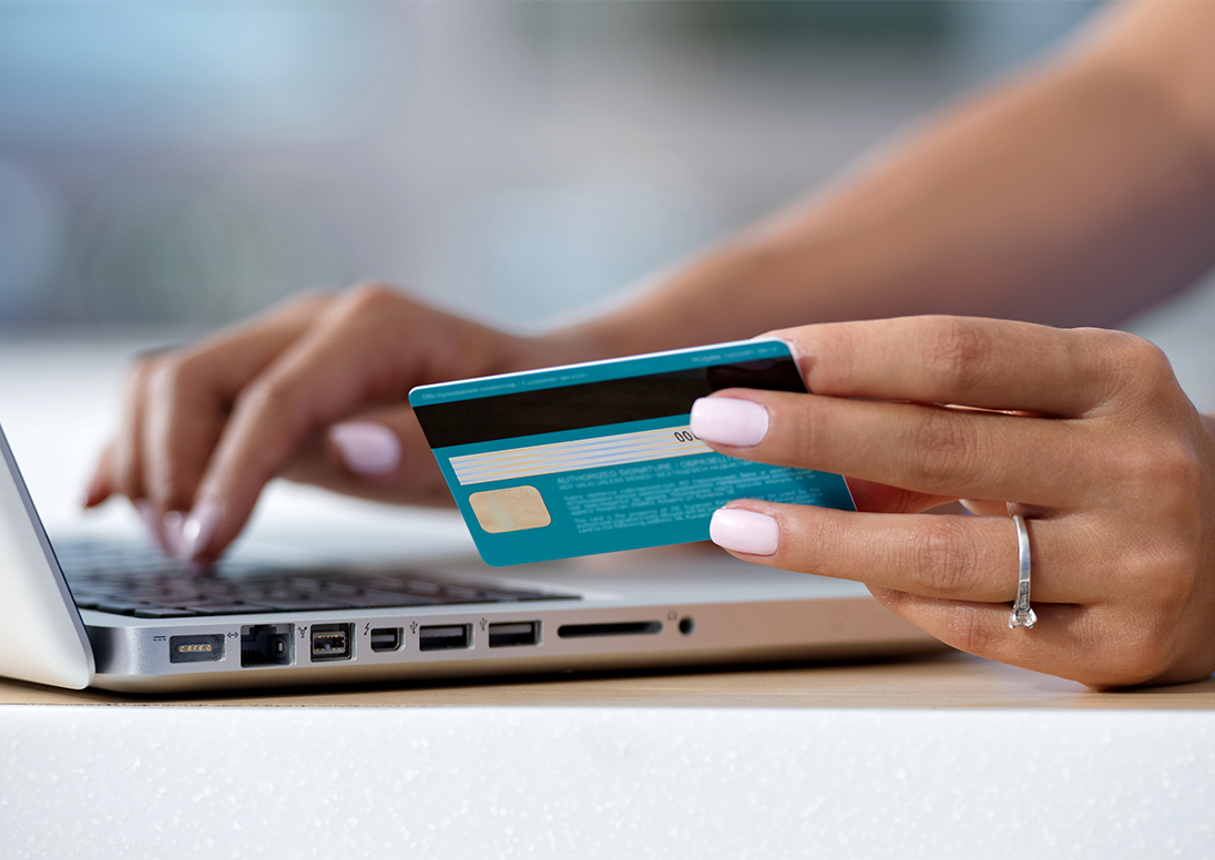 Person paying online with a credit card