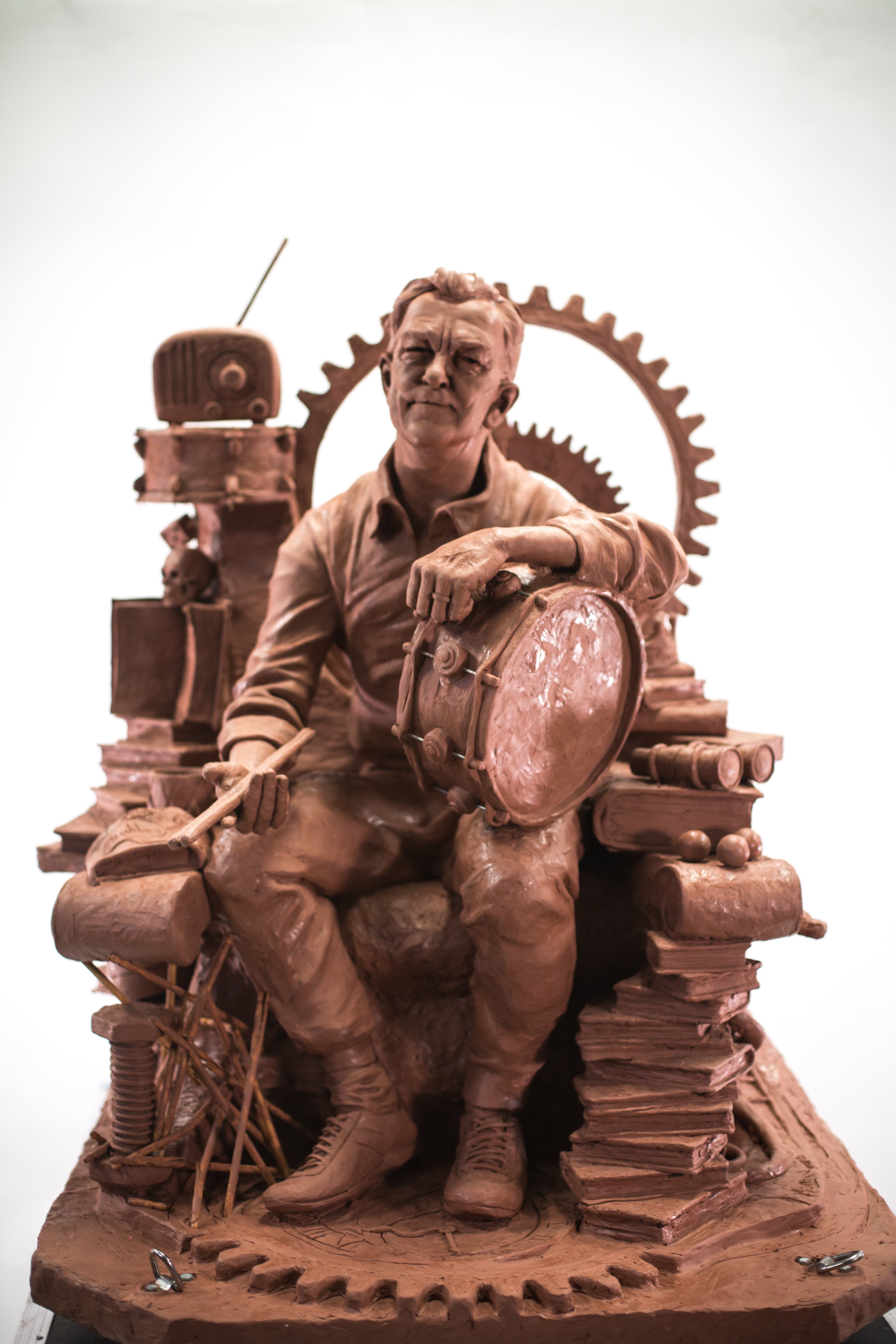 Artist rendition of Peart memorial sculpture featuring a younger Neil