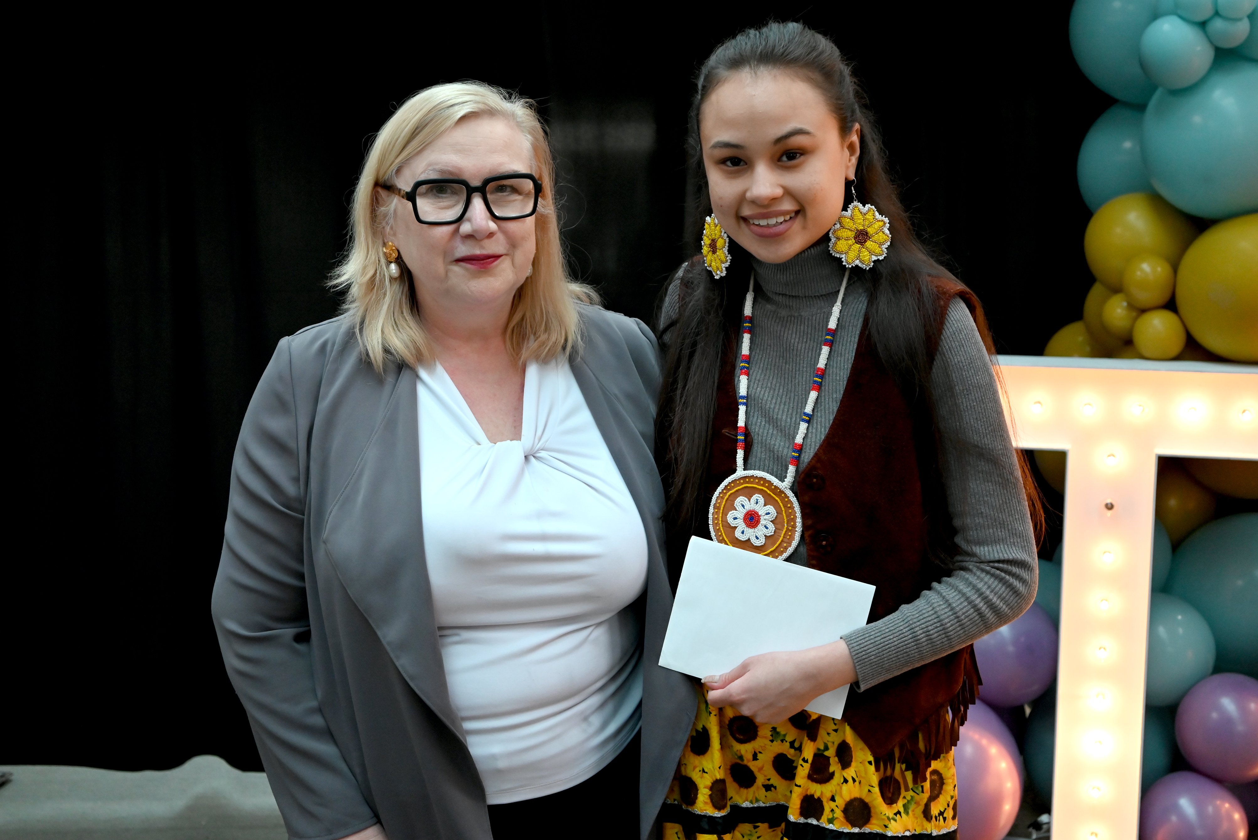 Wendy Cukier stands beside Youth Volunteer of the Year Award recipient Shyann Jenkins