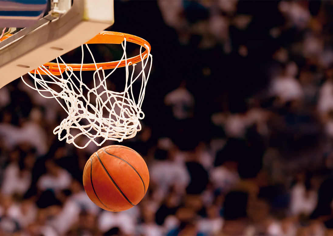 Basketball going into net