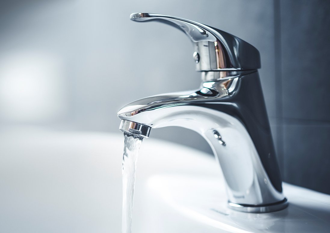 Water coming out of a faucet