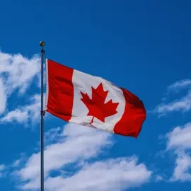 Canadian Flag Flying on Flag Pole